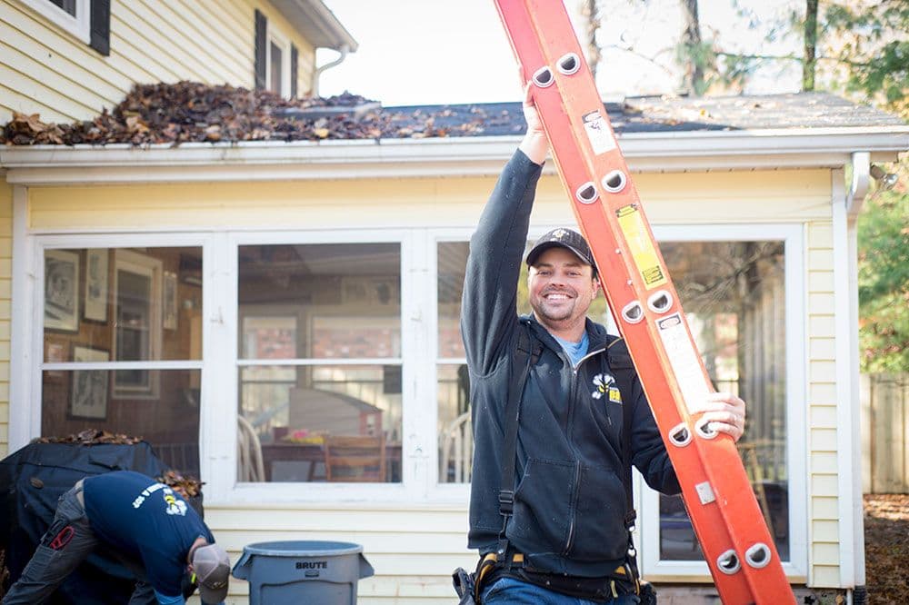 Man holding ladder